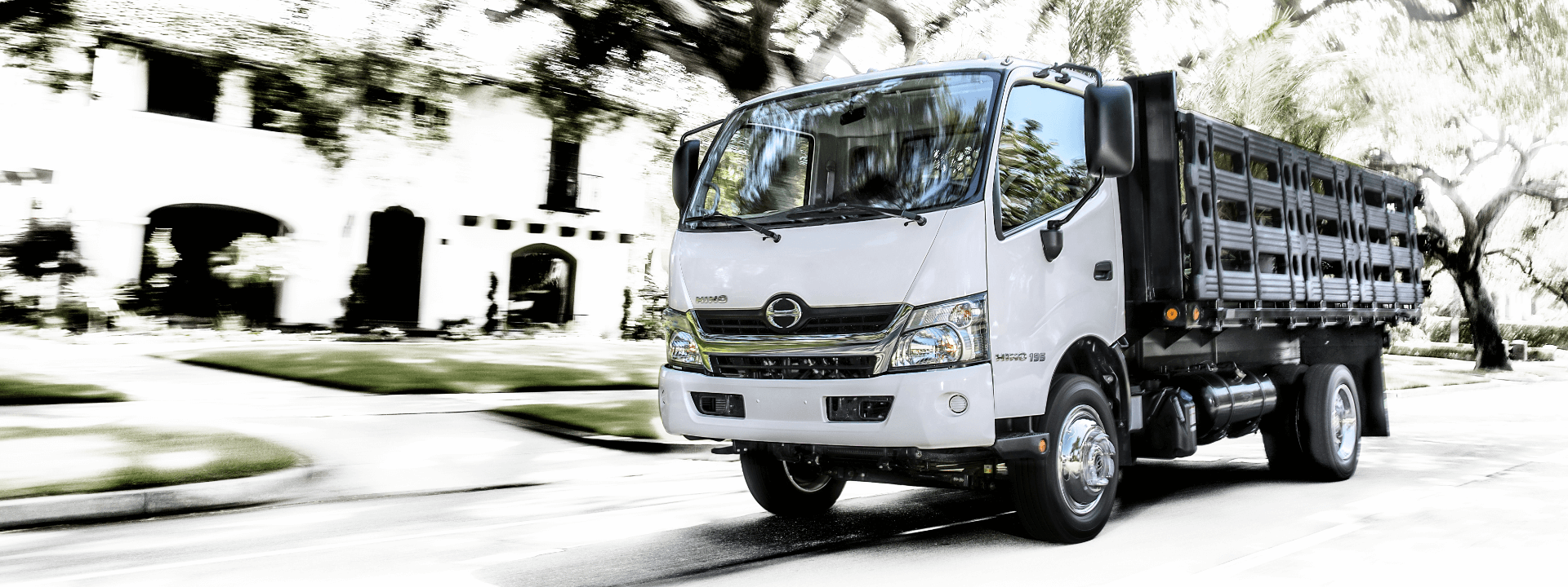White Hino truck in motion